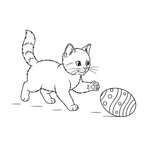 Kitten chasing Easter egg